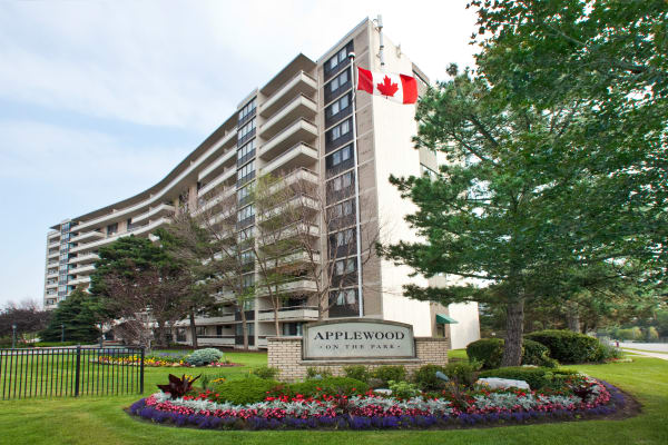 Beautiful green grass in front of Applewood on the Park in Mississauga