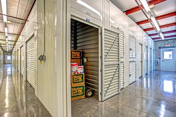 Open unit with packages at Metro Self Storage in Fort Myers, Florida