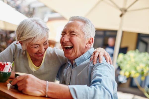 Residents socializing at The Welstone At Mission Crossing in Mission, KS