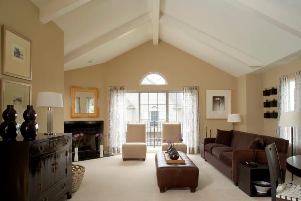 Living room in apartment at Legends Rosewood Village in Ypsilanti, MI
