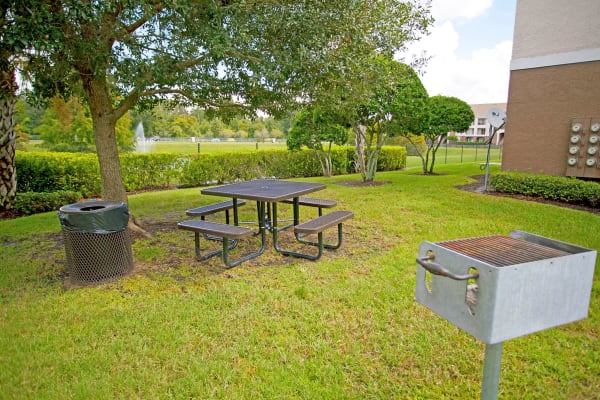 An inviting park bench on a sunny day near Legends Winter Springs in Winter Springs, Florida