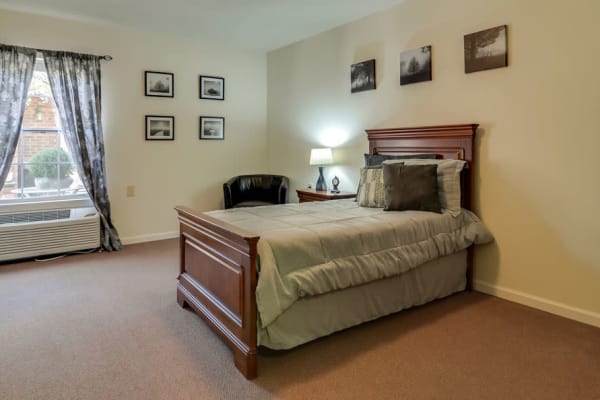 Assisted living apartment bedroom at Westbrook Terrace Senior Living in Jefferson City, Missouri