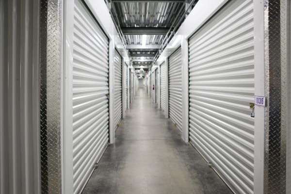 Interior units with white doors at StoreSmart Self-Storage in Columbia, South Carolina