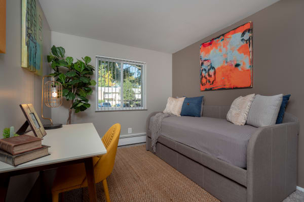 Spacious living room at Ann Arbor Woods Apartments in Ann Arbor, Michigan