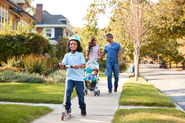 Family going for a walk near Jamestown Square Apartments in Blackwood, New Jersey