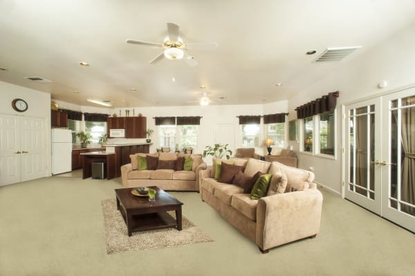 Spacious living room with an open floor plan at Mission Ranch Apartments in Chico, California