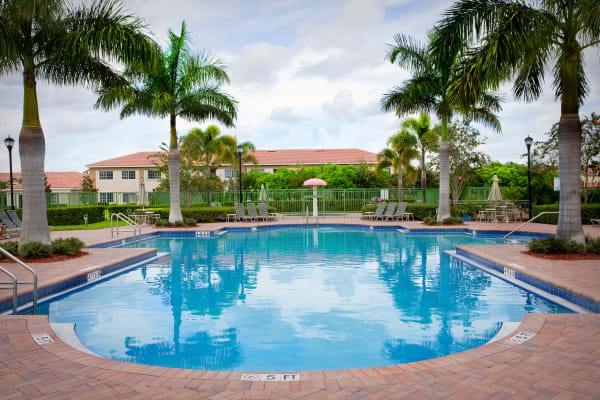 Beautiful outdoor pool at Green Cay Village in Boynton Beach, Florida