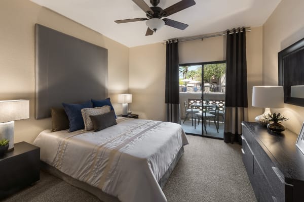 Primary Bedroom with ceiling fan at San Lagos in Glendale, Arizona