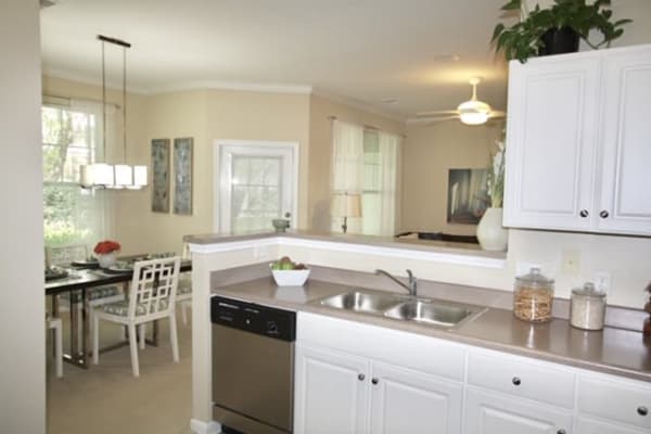 Dining room and kitchen at Legends Cary Towne in Raleigh, North Carolina