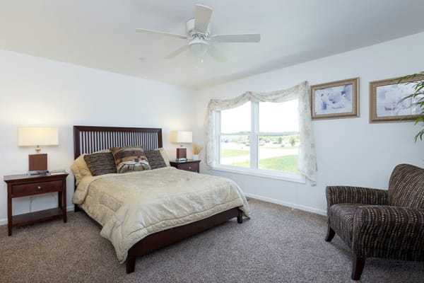 A spacious bedroom at The Landing of Clinton in Clinton, Iowa