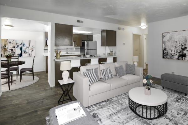 Brown Renovated Kitchen with stainless steel appliances at at Windgate Apartments in Bountiful, Utah