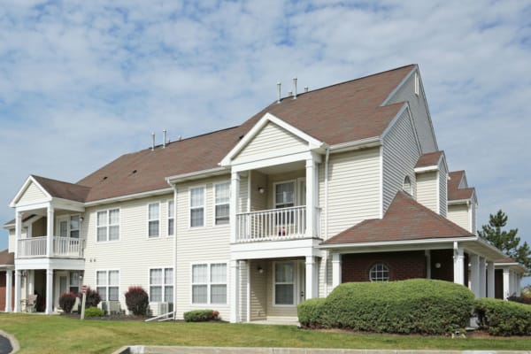 Exterior on a nice day at Bennington Hills Apartments in West Henrietta, New York