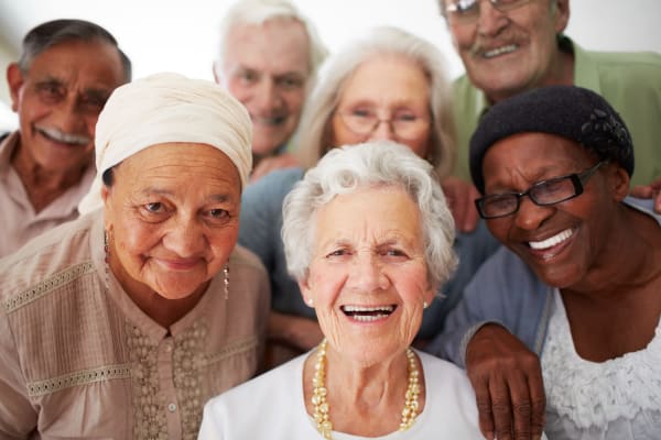A group of residents pose for the camera at First & Main of Bloomfield Township in Bloomfield Township, Michigan