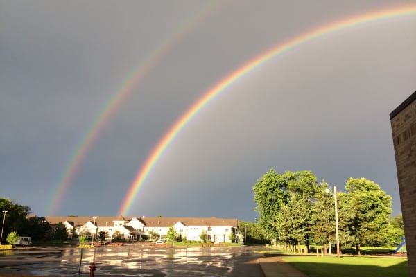 Double rainbow over Deephaven Woods in Deephaven, Minnesota