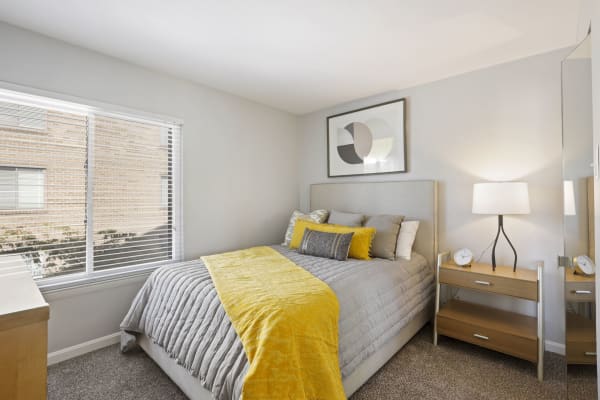 Bedroom and walk-in closet at Washington Apartments in Washington