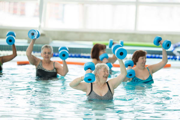 Residents exercising in the pool at The Springs at The Waterfront in Vancouver, Washington