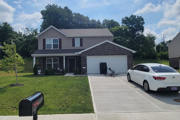 Two-story home in Ft. Wright with a wide driveway
