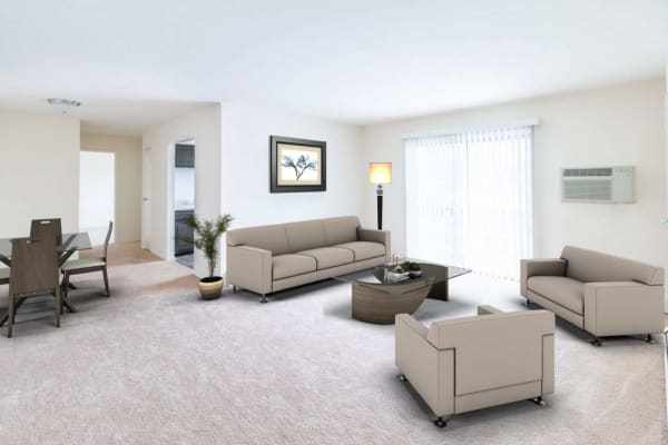 Spacious living room and dining area in a model apartment home at Washington Gardens in Washington, New Jersey