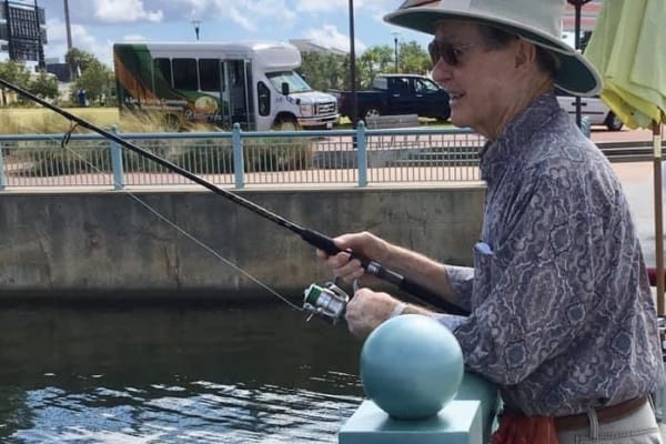 Man fishing at Wesley Haven Villa in Pensacola, Florida