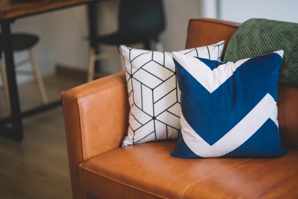 Leather sofa in the living room of a model home at Janet Circle in Columbus, Ohio