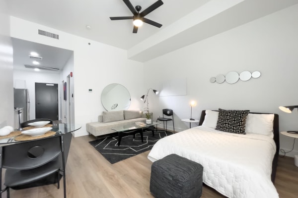 Modern studio apartment with a nice ceiling fan at The Charleston Apartments in Phoenix, Arizona