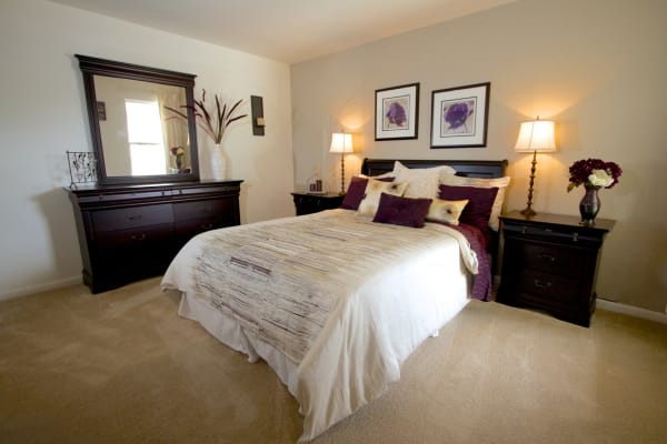 cozy bedroom at Windsor Lake Apartments in Virginia Beach, Virginia