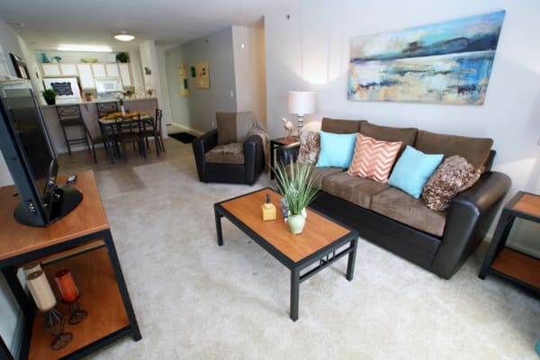 Large and brightly lit living room interior at Campus Crossings in Murfreesboro, Tennessee