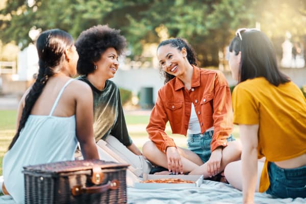Residents and friends hanging out in the park near Aston Pointe in Aston, Pennsylvania