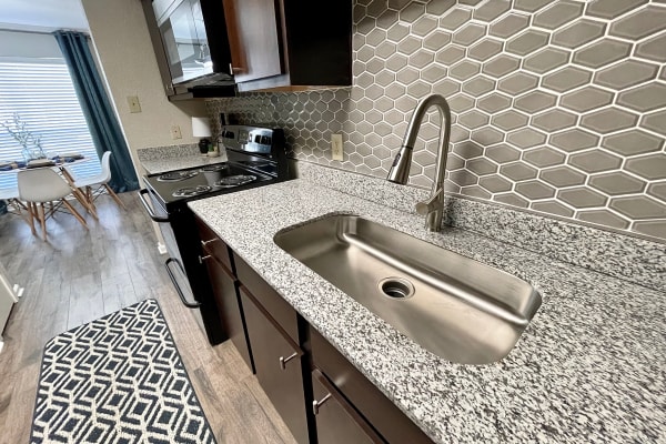 Modern-style kitchen at The Abbey at Jones Road in Houston, Texas