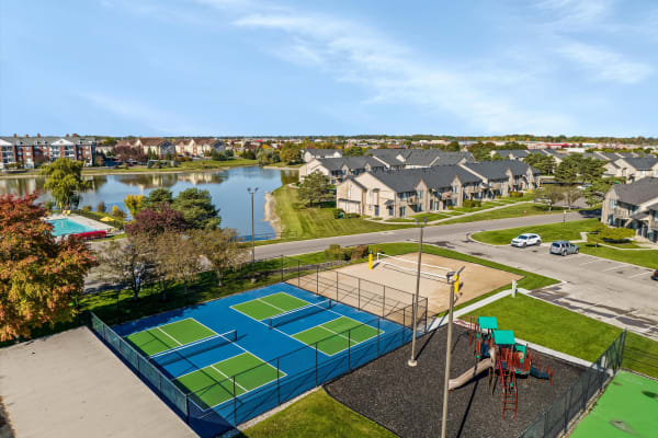 Aerial view of the tennis courts and playground at Lakeside Terraces in Sterling Heights