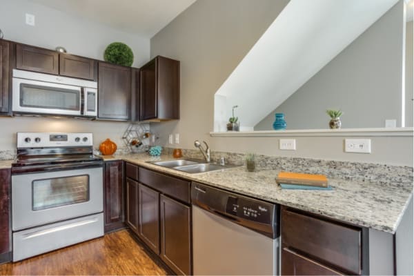 Ultra-modern kitchen in a model apartment at Parkside Towns in Richardson, Texas