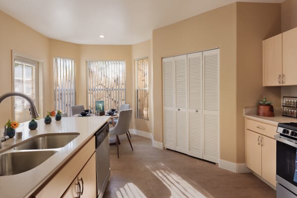 Kitchen inside an apartment at Allegro at La Entrada in Henderson, Nevada