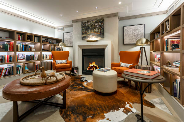 Resident lounge with cozy fireplace at Canvas Valley Forge in King Of Prussia, Pennsylvania.