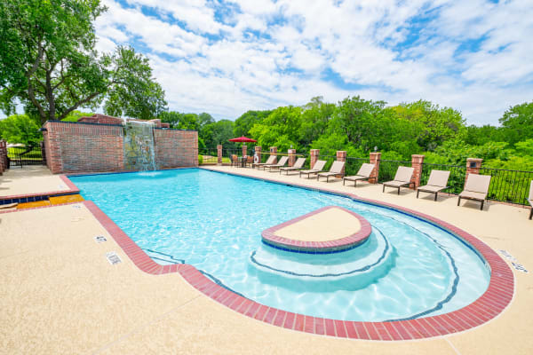 Aerial view of luxury swimming pool at Carrollton Park of North Dallas in Dallas, Texas