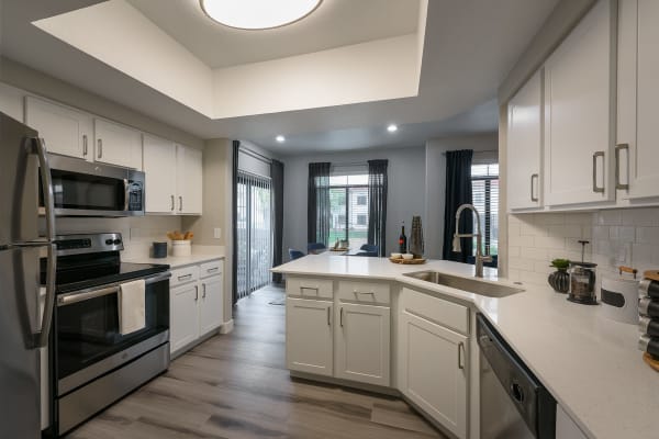 Kitchen with marble countertops at The Ventura in Chandler, Arizona