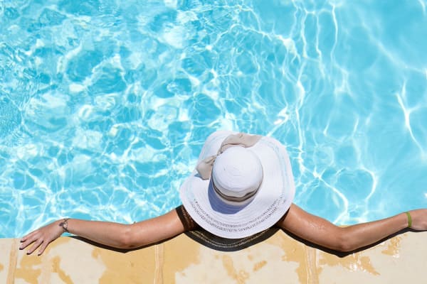Resident relaxing in the pool at Hidden Creek in Vacaville, California