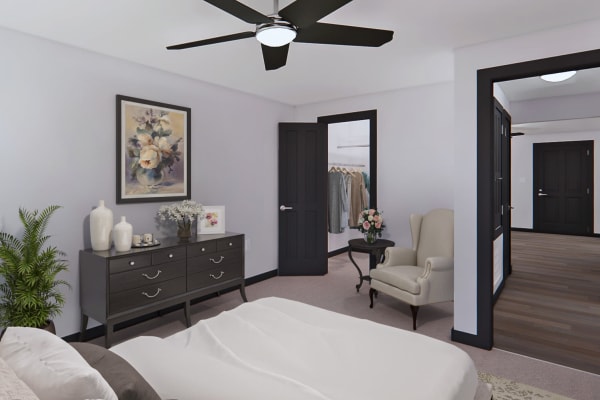 A render of a cozy bedroom at The Papillon in Pensacola, Florida