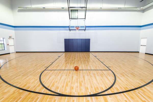 Indoor basketball court at Carrollton Park of North Dallas