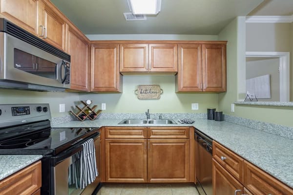 Kitchen with appliances at Castellino at Laguna West in Elk Grove, California