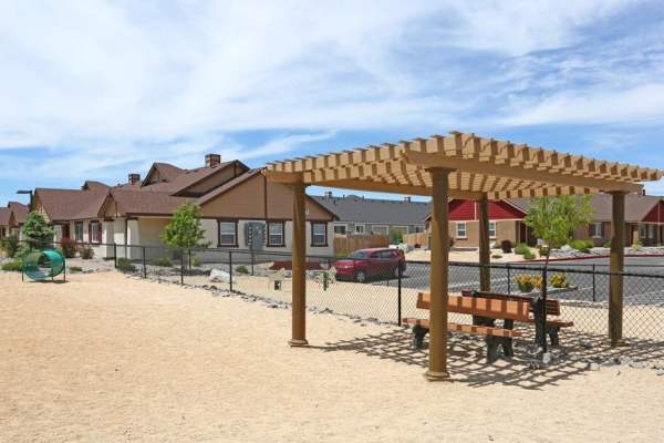 Community park with benches at The Bungalows at Sky Vista in Reno, Nevada