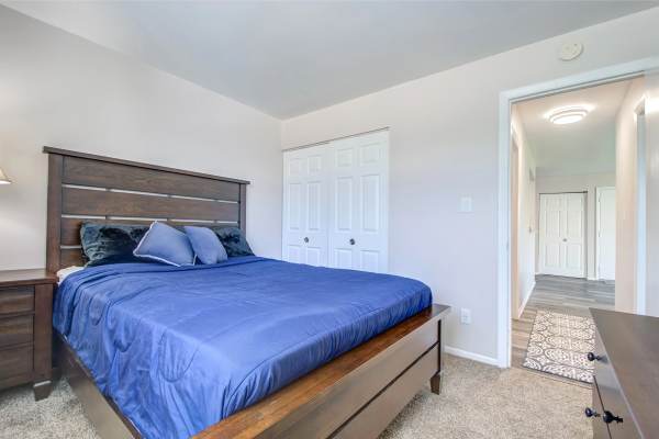 Spacious bedroom with bed at Hidden Creek in Crown Point, Indiana