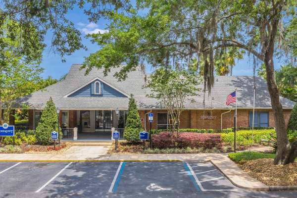 Exterior of the building and the parking lots in front at Rosemont Windermere in Orlando, Florida