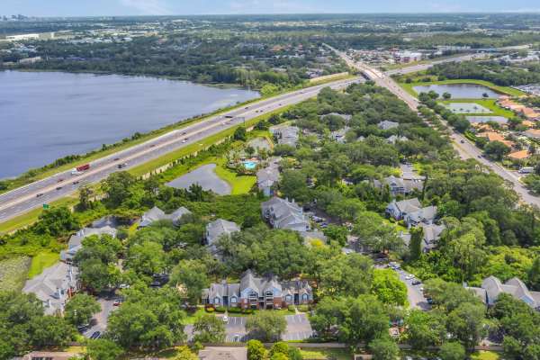 Aerial view of the community with multiple trees at Rosemont Windermere in Orlando, Florida