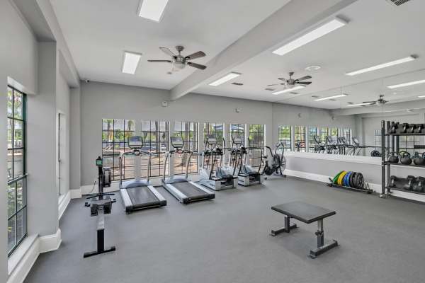 Well-equipped fitness center with multiple treadmills at Rosemont Windermere in Orlando, Florida