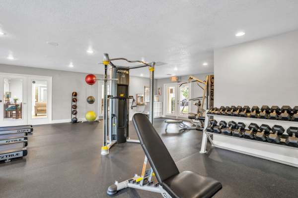 Well equipped fitness center at The Canopy Apartment Villas in Orlando, Florida