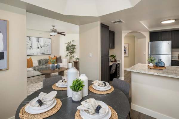 Spacious living room layout with autumn-toned furniture at San Marin at the Civic Center
