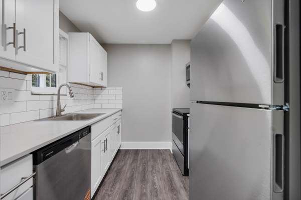 Kitchen with dishwasher at Valley Brook Townhomes in Rochester, New York