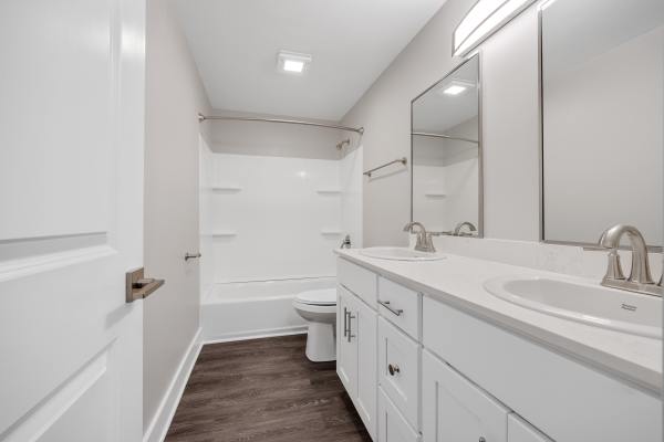 Bathroom with vanity mirror at Valley Brook Townhomes in Rochester, New York