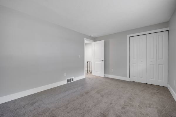 Unfurnished bedroom at Valley Brook Townhomes in Rochester, New York