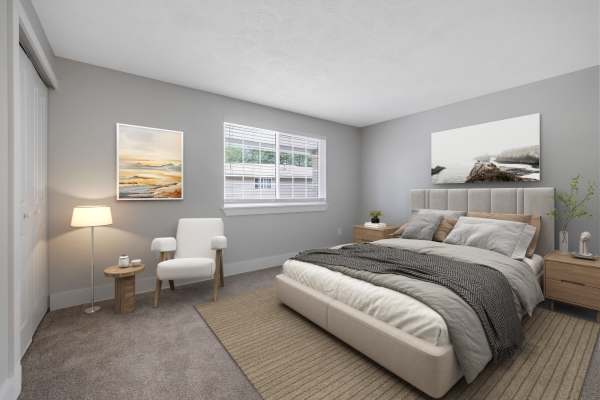 Bedroom with window  at Valley Brook Townhomes in Rochester, New York